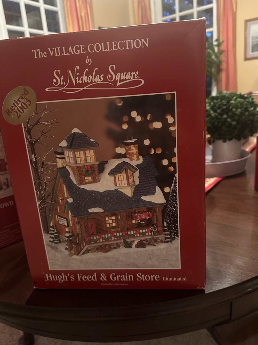 St. Nicholas Square Red and White Holiday Village Building